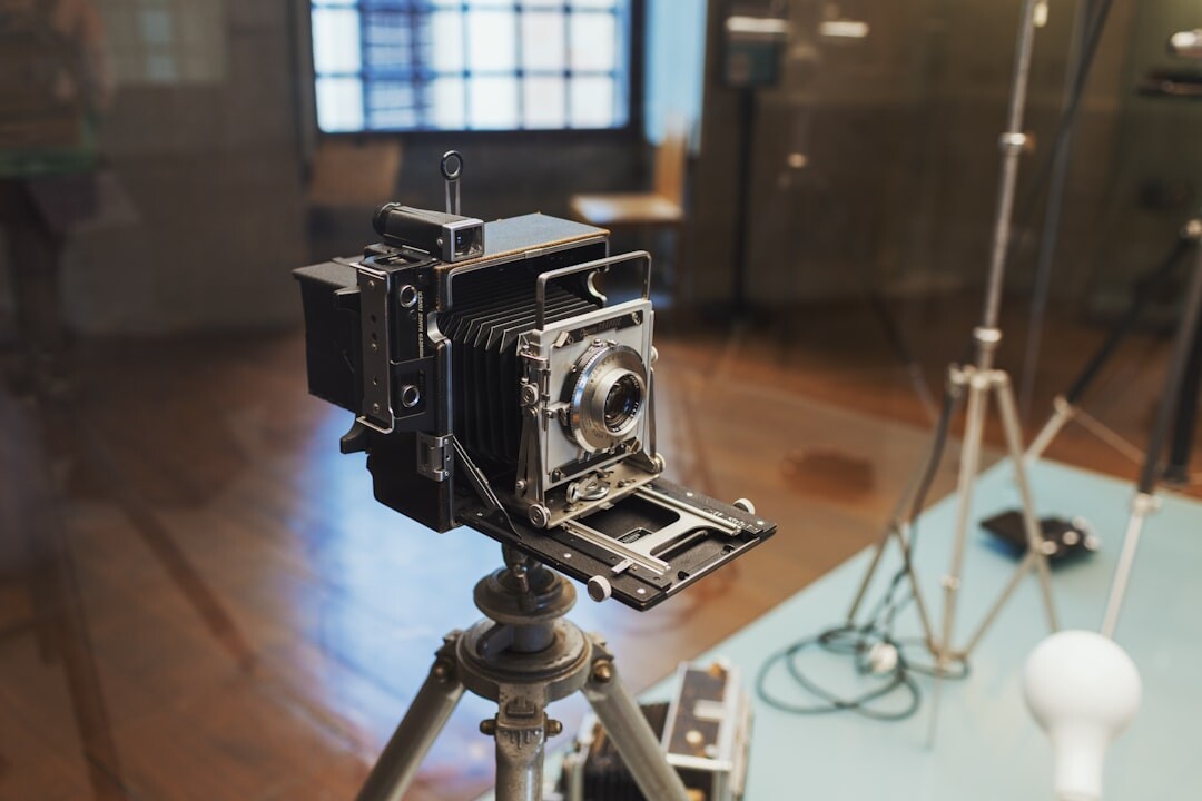 Professional broadcast camera on studio tripod