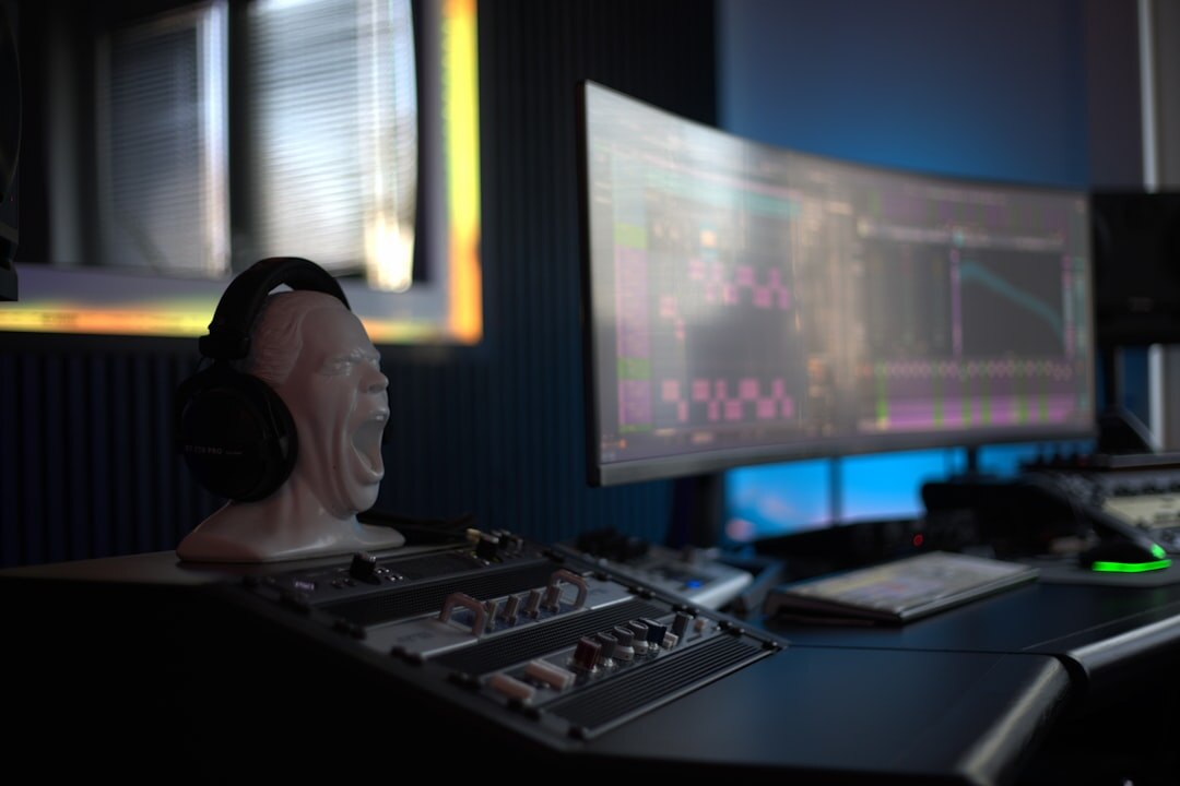 Studio team working at production desk together
